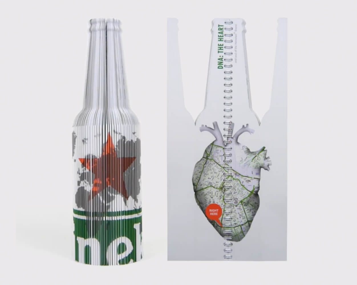 Bottle Book by John Stam and Jessica Kersten: a Heineken bottle of paper pages revealing a heart